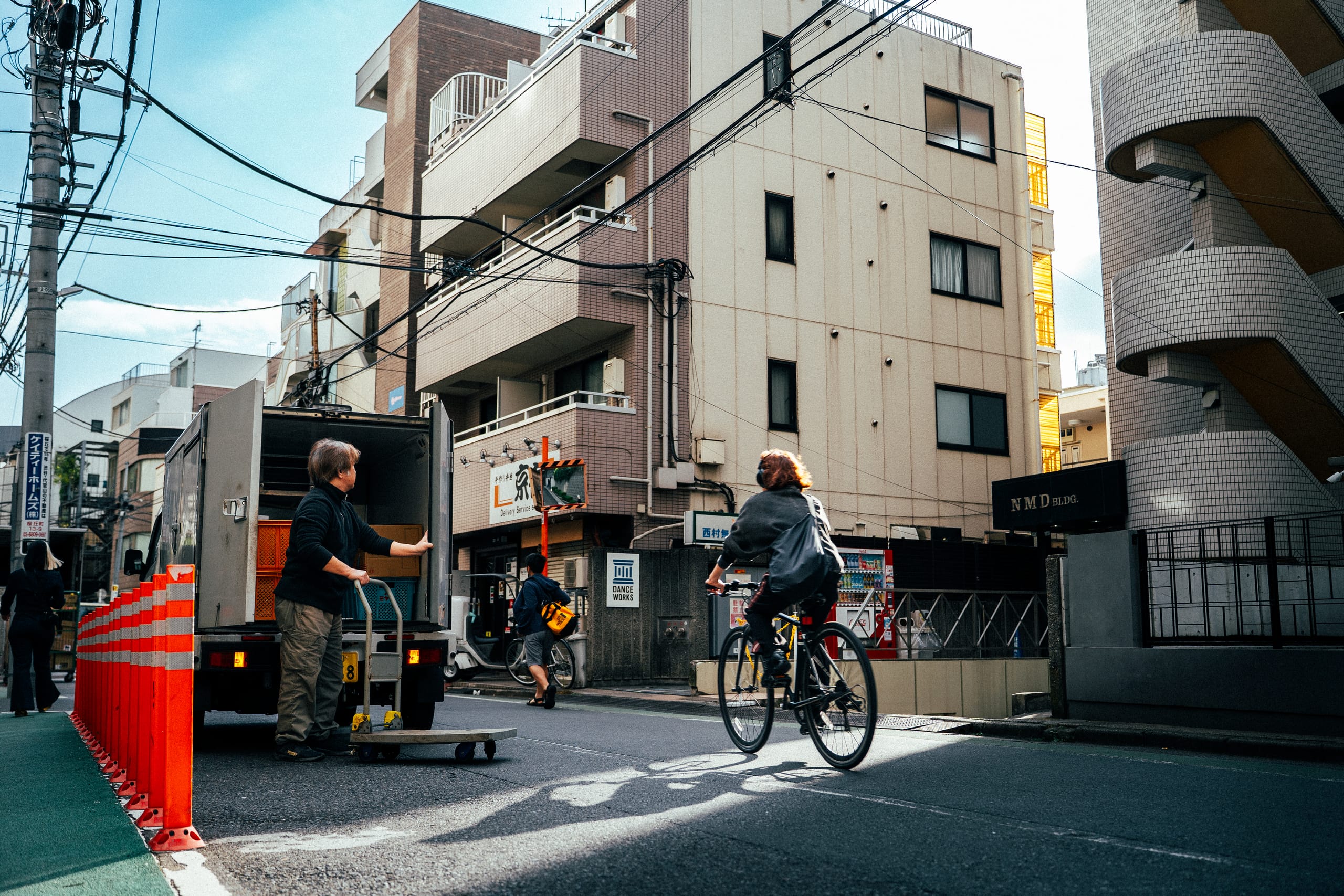 Cyclist on a quiet residential street in daylight